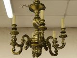 a chandelier that is hanging from the ceiling
