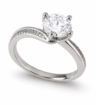 a close up of a diamond ring on a white background