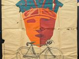 une affiche accrochée au mur d'un magasin de vélos