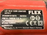 an image of a close up of a red flexx corded drill