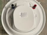 an overhead view of a toilet with the lid up