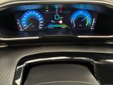 the dashboard of a car with a digital display on it