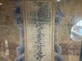 a picture of a painting on the wall of a room