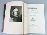 an open book with a picture of a man in a black and white image