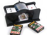 a black card holder with playing cards and a box of playing cards