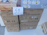 several boxes of electronic equipment are stacked on top of each other