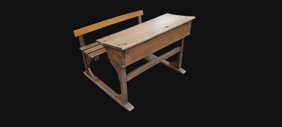 a small wooden desk with a chair on it