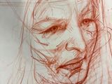 drawing of a woman ' s face in red ink on a piece of paper