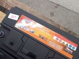 a car battery that is sitting on top of a pallet