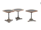 three small tables with marble tops and metal bases
