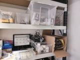many boxes on the shelves in the room