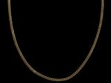 un collier en or avec une chaîne sur fond noir