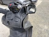 a motorcycle that is parked on the side of the road