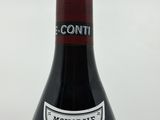 a bottle of wine that is sitting on a table