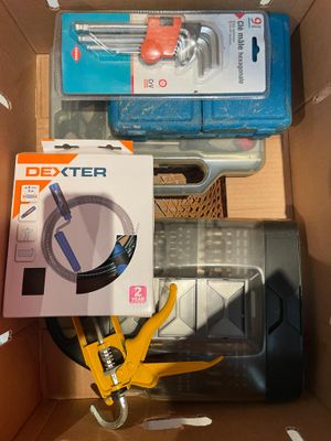a box of tools that are sitting in a box