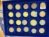 a display case with a lot of coins in it