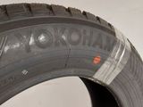 a close up of a tire on a white surface
