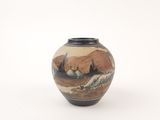 a small vase with a painting on it on a white surface