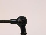 a close up of a black pipe with a white background