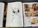 a picture of a book with a bunch of drawings on it
