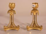pair of antique brass candlesticks with ornate decoration