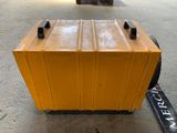 a yellow box sitting on the ground next to a fork