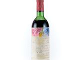 a bottle of wine that is sitting on a table