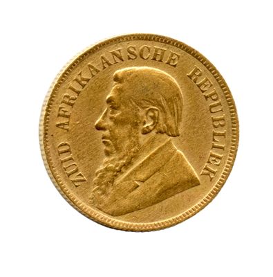 l'image d'une pièce d'or sur laquelle figure le visage d'un homme
