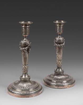 pair of antique silver candlesticks