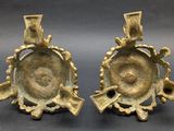 pair of antique brass candlesticks with floral decoration