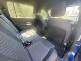 the back seats of a car with a seat belt in a car