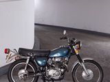 a motorcycle that is parked in a parking garage