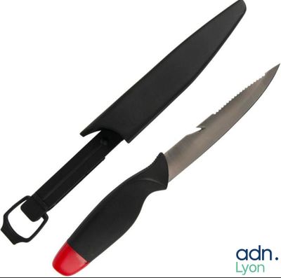two knives that are next to each other on a white surface