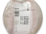 a plastic ball with a label on it on a white surface