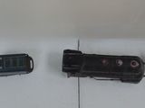 several toy trains are lined up on a white surface