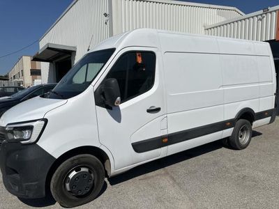 a picture of a white van parked in a parking lot