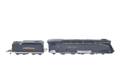 une image représentant une locomotive noire posée sur une surface blanche