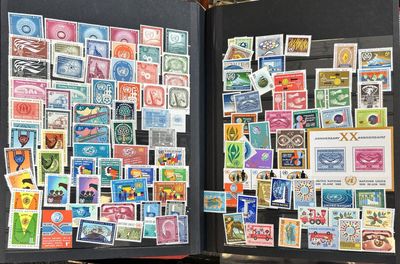 a open book with stamps on it on a table