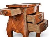 an image of a wooden table with three drawers on top of it