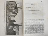 an open book with a picture of a building on it