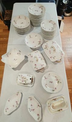 a table with a lot of plates and bowls on it