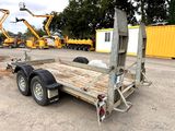 a trailer that is parked in a parking lot