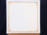 a picture of a painting on a easel with a black background