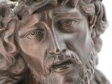 close up of a statue of jesus with a crown of thorns on his head