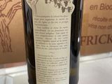 a bottle of wine that is sitting on a table