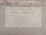 a plaque on the side of a building that says, maison - au - braun & co
