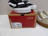 pair of vans old skool sneakers in box on white surface