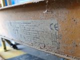 a close up of a piece of paper on a piece of metal