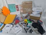 a table with a lot of office supplies on it