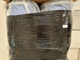a large stack of plastic bags on top of a pallet